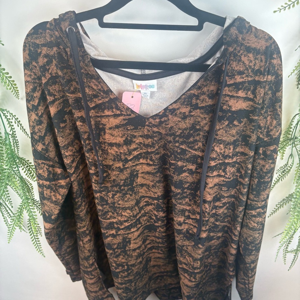 LuLaRoe  sweater with hood. Animal print. Size XL.